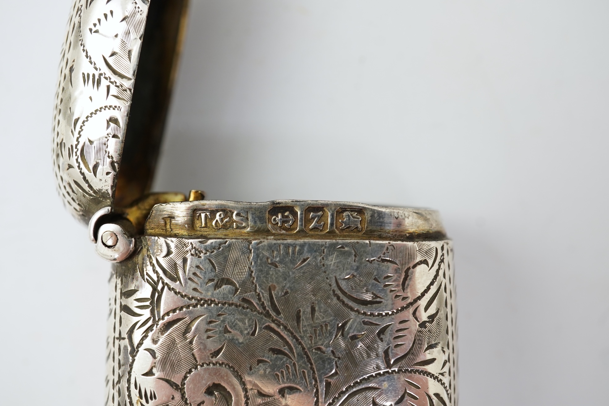 A late Victorian engraved silver oval combination sovereign and vesta case, by W H Tandy & Sons